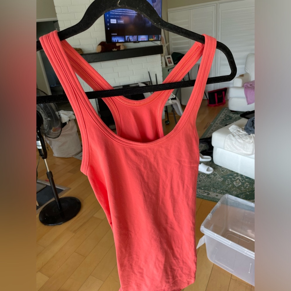 Lululemon orange workout top. Size 4